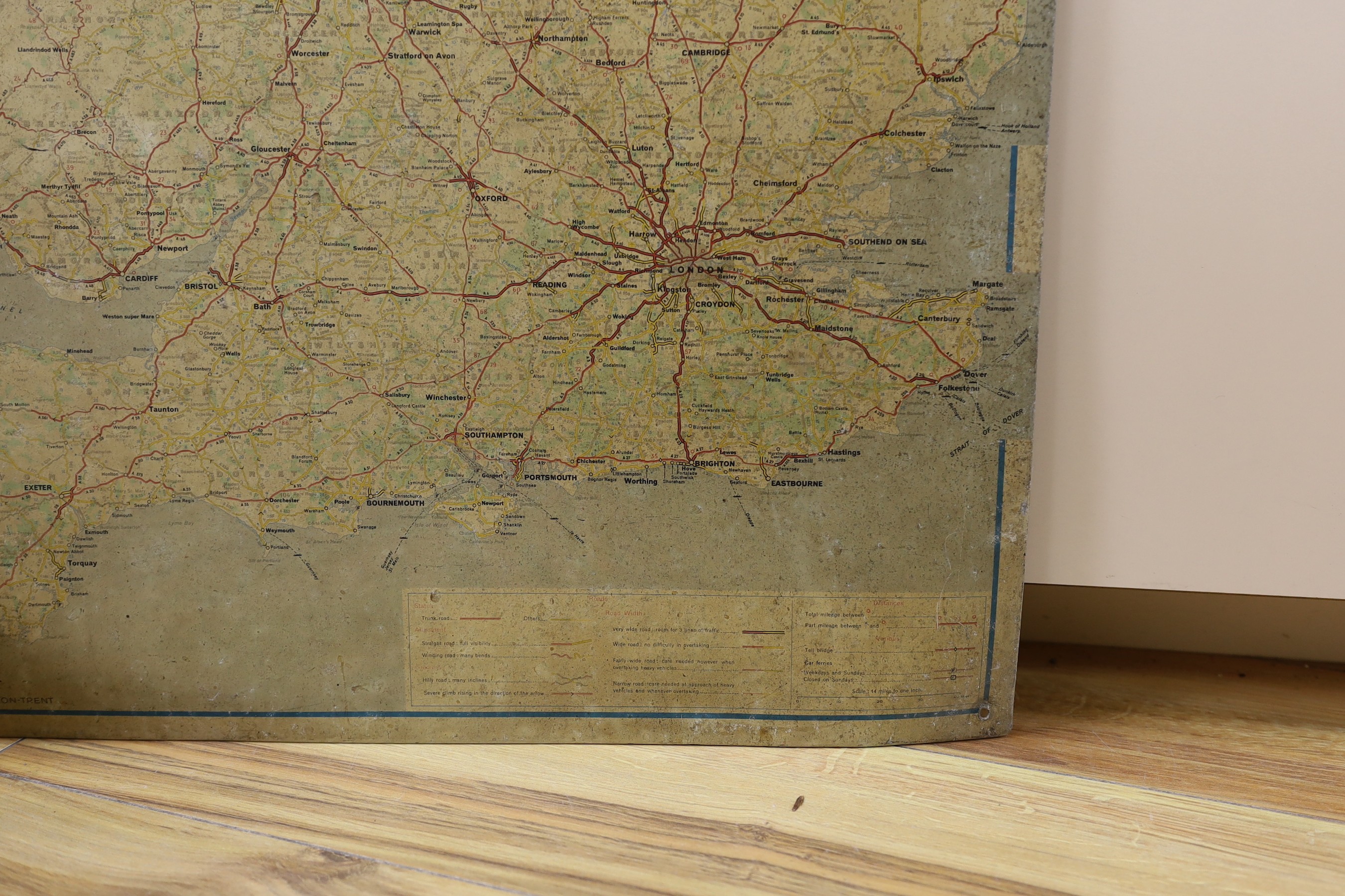 A BP oil can, Michelin motoring map and a revolving globe.